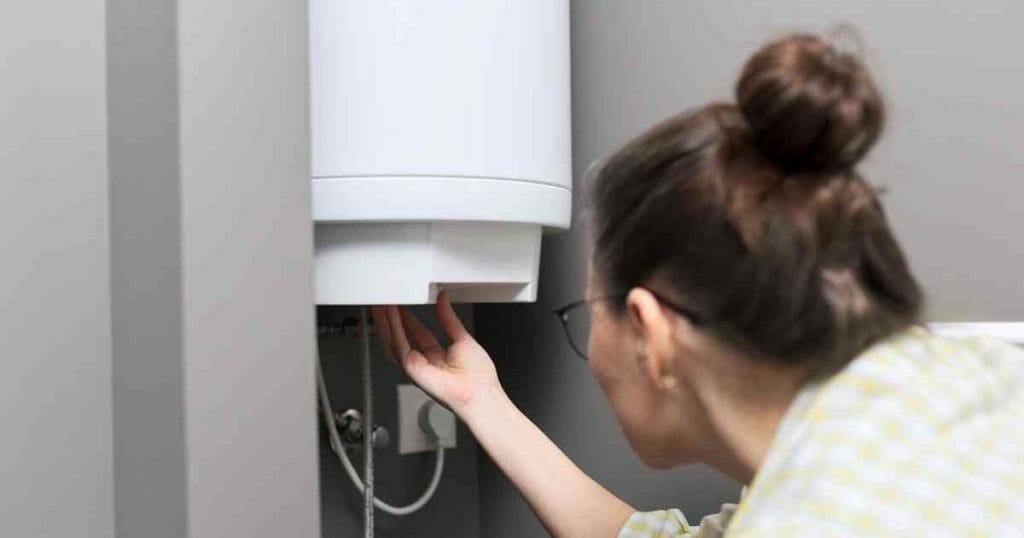 showing how to reset hot water heater